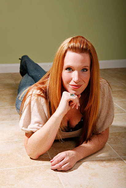 istock Woman laying on floor 179064299