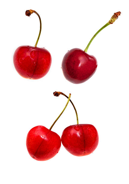 istock red sweet cherry closeup isolated on white 179064348