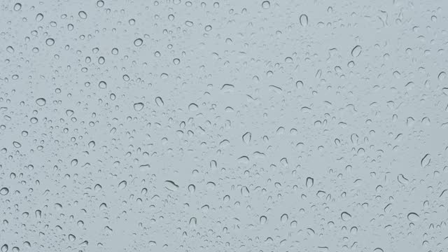 Super slow video: Video of water droplets on the windshield