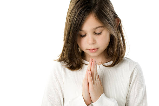 istock caucasian Girl Praying with Eyes Closed 179065804