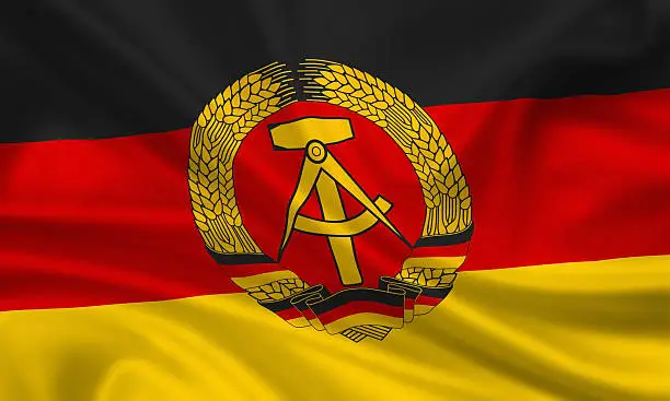 waving flag of the german democratic republic