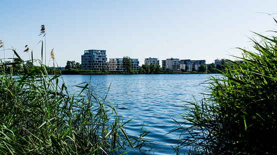 scenic view over Ziegelsee in Schwerin to new buildings at the lakeshore
