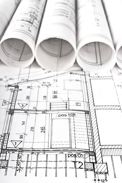 architectural project and blueprints rolls stock photo