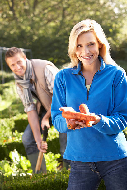 istock Young couple posing in garden 179067937
