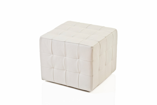 White footstool isolated against white background