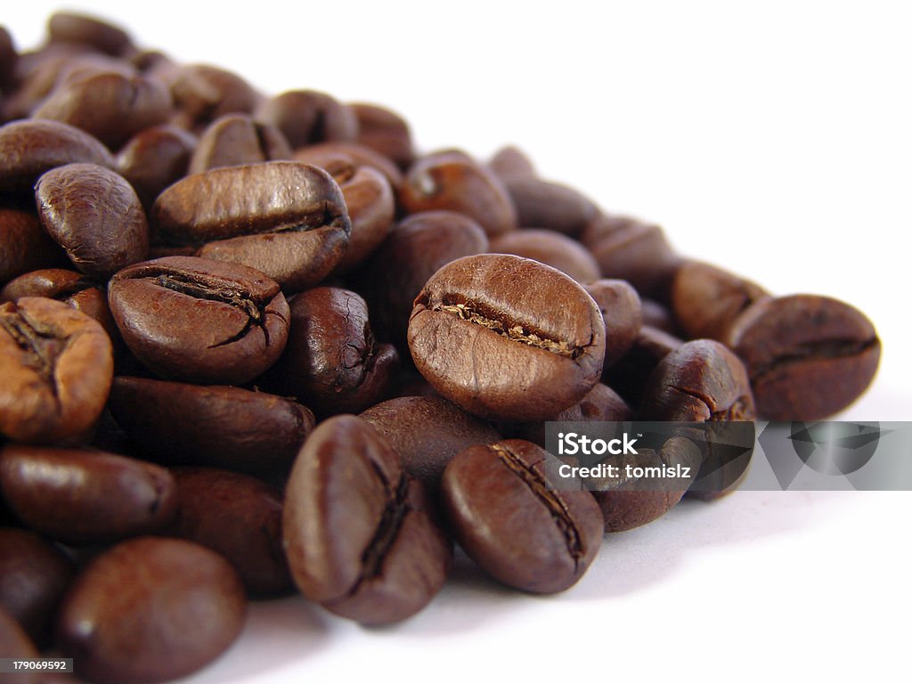 Coffee beans on white background Addiction Stock Photo