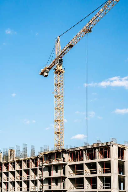 istock Construction industry building. Construction industry site with cranes, fittings and concrete. 1790707507