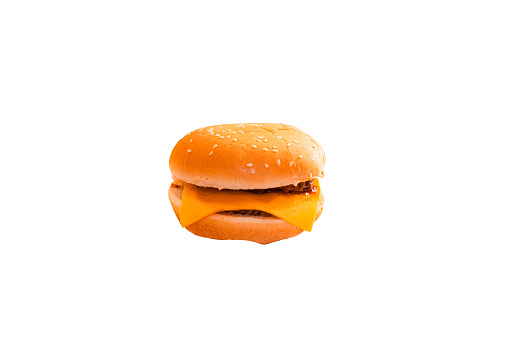 Picture of a hamburger die cut in a restaurant  with clipping path