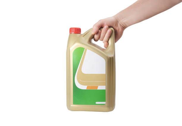 istock A hand holds a plastic canister with motor oil on a white background. 1790716491