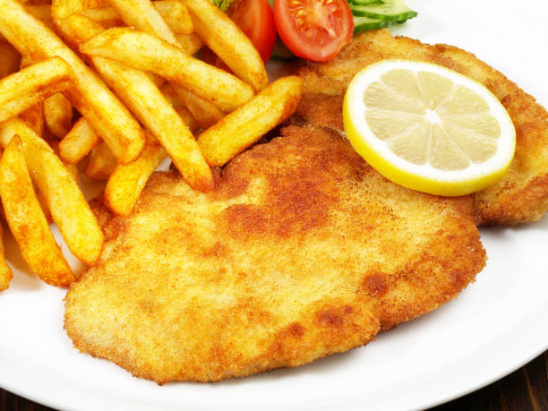 istock Breaded Schnitzel with French Fries 1790717566