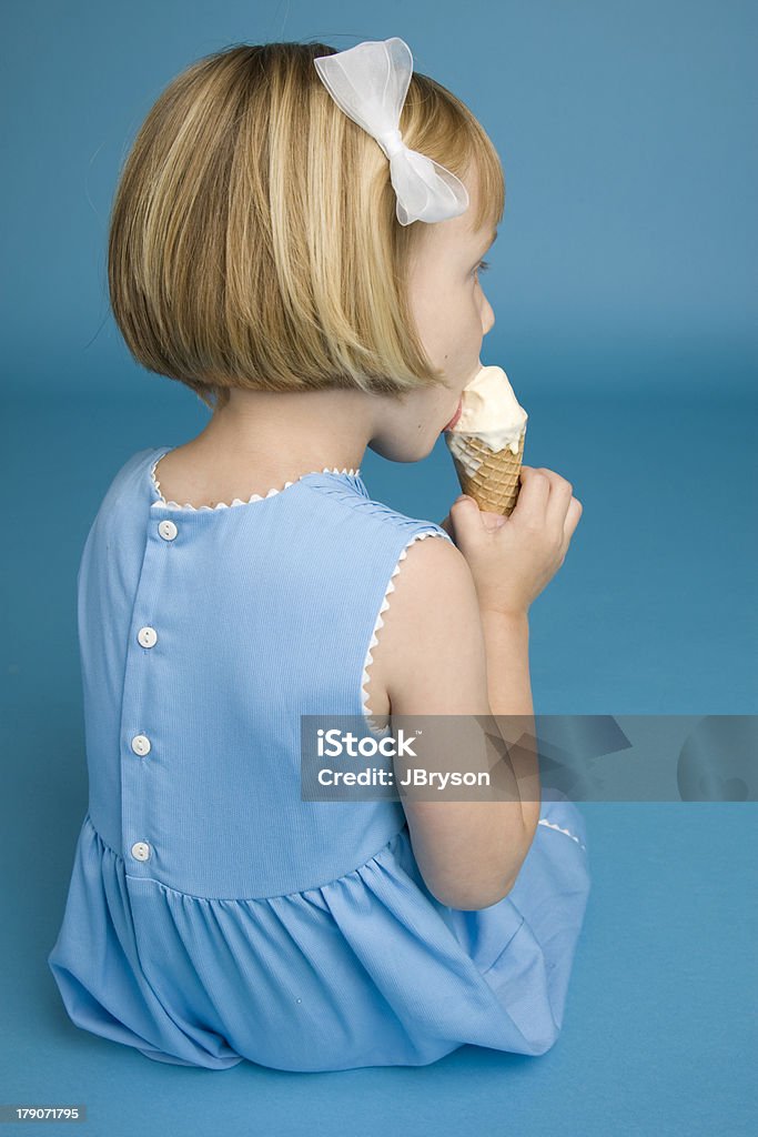 Five Year Old caucasian Girl with Ice Cream Cone Cute 5 year old caucasian girl with an ice cream cone. 4-5 Years Stock Photo