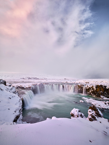 Majestic Goðafoss waterfall during winter day in Iceland. Photographed in medium format.