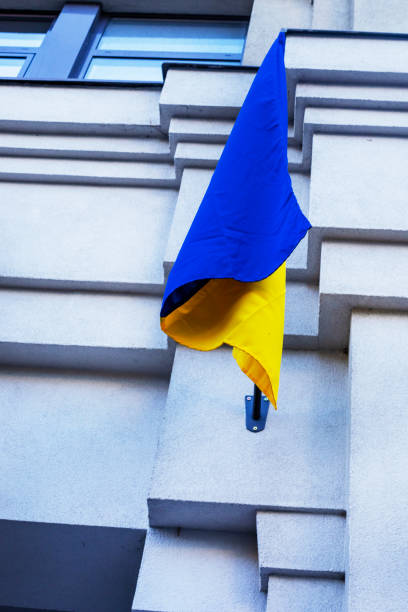 istock Ukrainian flag on an architectural building. Support and War in Ukraine 1790722551