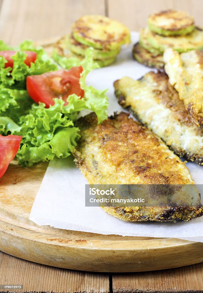 Fried mackerel Fried mackerel with salad and tomato Appetizer Stock Photo