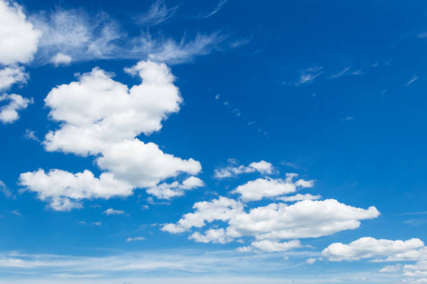 istock Cumulus clouds in blue sky, white fluffy clouds floating in blue sky 1790730020