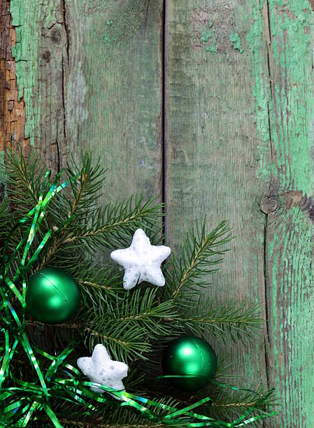 istock Christmas wooden background is green fir tree  branches 179074615