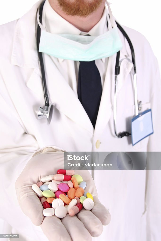 Médico con comprimidos - Foto de stock de Abrigo libre de derechos