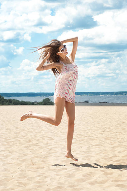istock Young woman on the beach 179075253