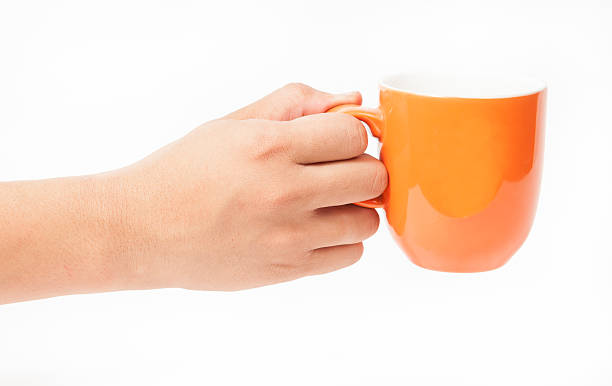 istock Man holding a cup of coffee, 179076058