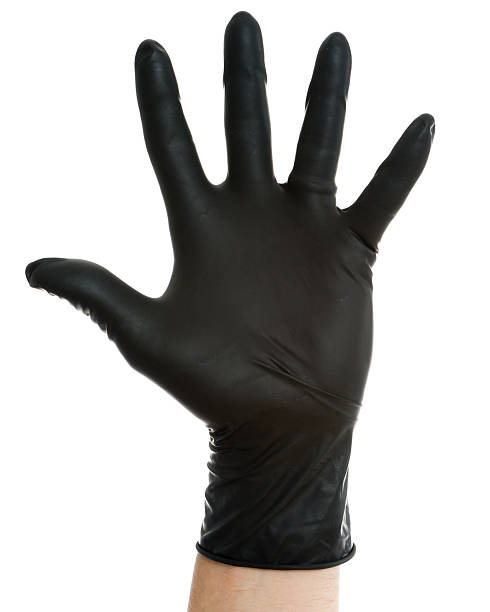 Hand in Black Glove - Stop stock photo