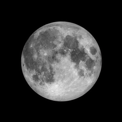 Close-up of the full moon seen on black space background at night.