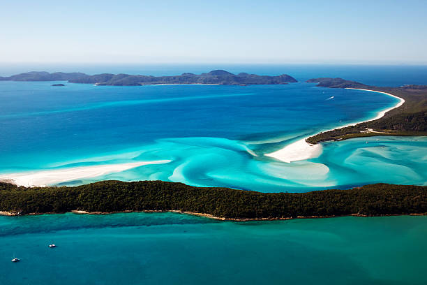Aerial view of Whitehaven beach in Whitsunday islands Aerial of Whitehaven Beach and hill inlet in the Whitsundays, Queensland Australia.  great barrier reef queensland stock pictures, royalty-free photos & images