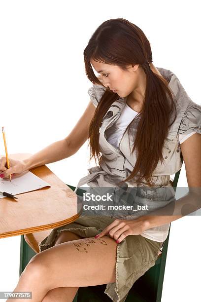 Asian Schoolgirl Is Preparing To Cheat On Test Stock Photo - Download Image Now - High School Student, Sitting, 16-17 Years