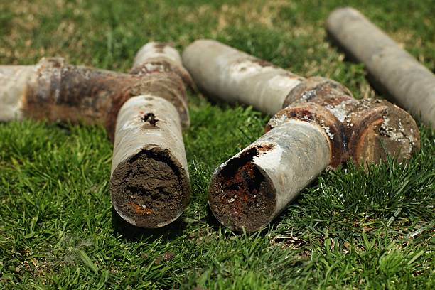 Blocked and Corroded Steel Household Pipes stock photo