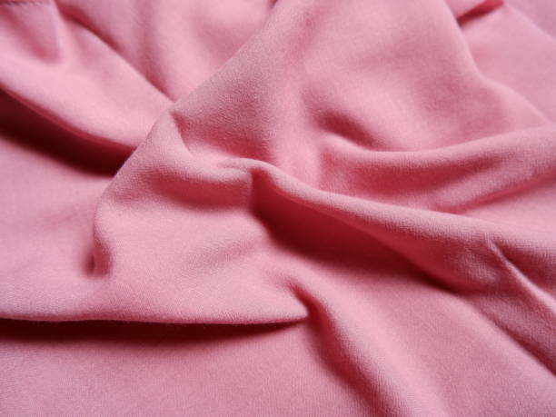 istock Pink fabric texture with beautiful close up details suitable for craft projects and sewing clothes. 1790779361