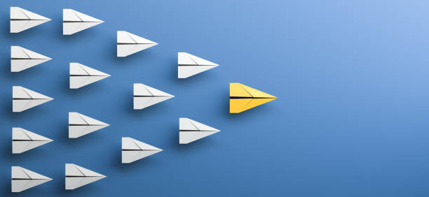 istock Leadership concept, yellow leader plane leading white planes, on blue background with empty copy space on right side 1790782526