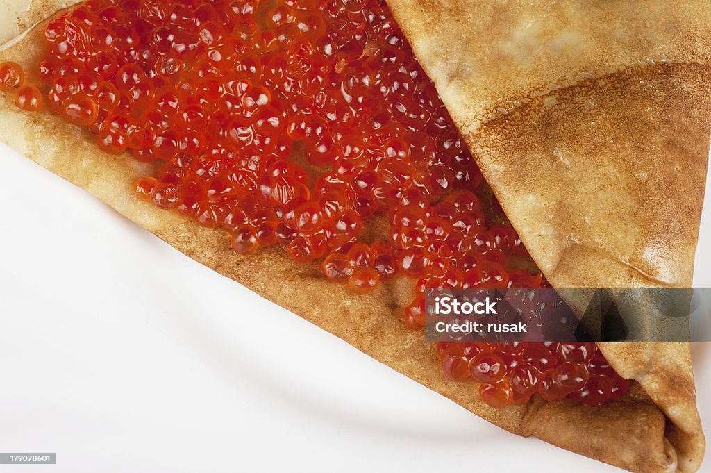 Pancake with red caviar Pancake with red caviar closeup photo Appetizer Stock Photo