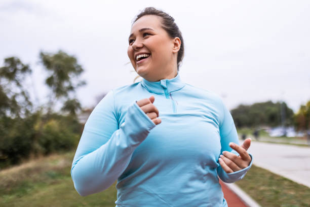 istock Woman Thriving in Fitness Happiness 1790788607