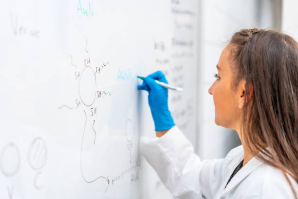 istock Scientist conducting a study with a scholarship in a laboratory 1790798405