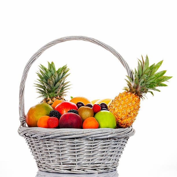 istock assorted fruits in wicker basket 179080187