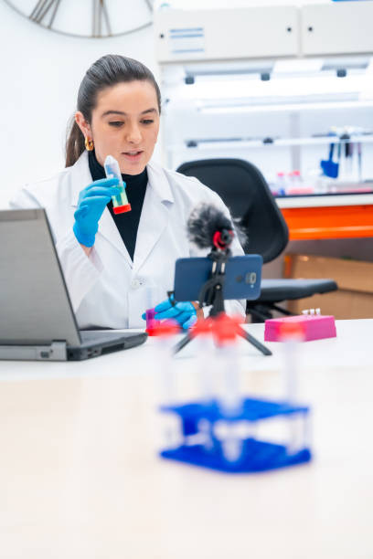 istock Scientist recording a scientific video podcast in a lab 1790814685