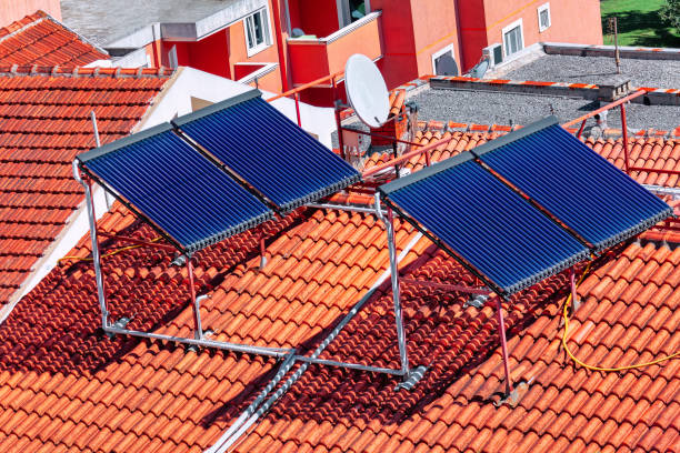 istock Solar collectors for heating water on the rooftop 1790814690
