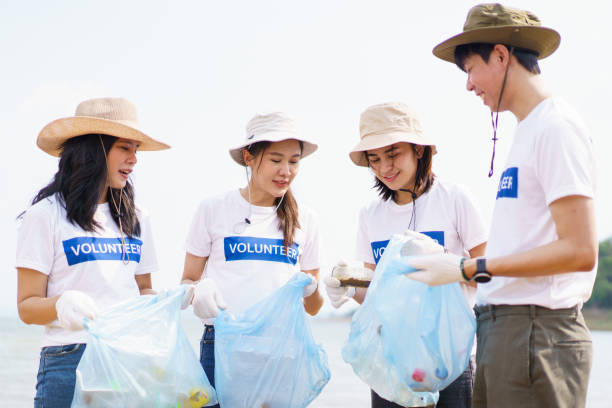 istock Asian volunteers cleaning environment. 1790815659