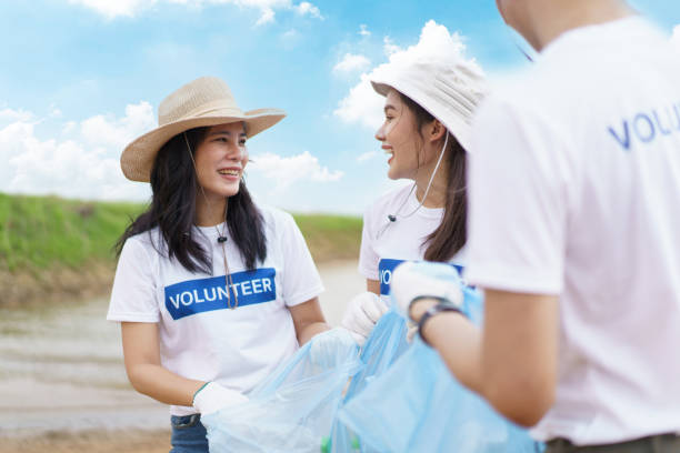 istock Asian volunteers cleaning environment. 1790815673