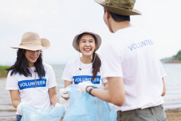 istock Asian volunteers cleaning environment. 1790816203