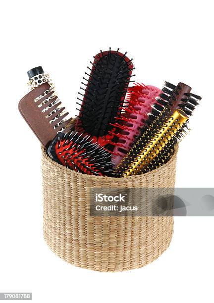 Different Kinds Of Hairbrushes Inside A Straw Basket Stock Photo - Download Image Now