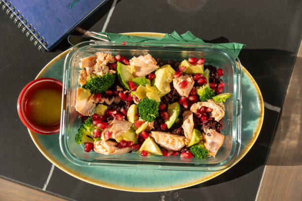Lemon garlic roasted broccoli salad with pomegranate and avocado