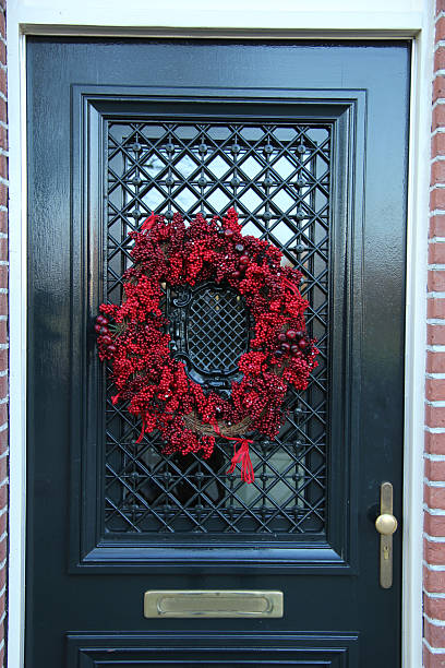 istock Christmas wreath on a door 179084119