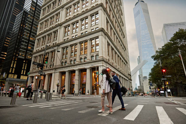 istock Corporate colleagues walking in Lower Manhattan at dusk 1790845602