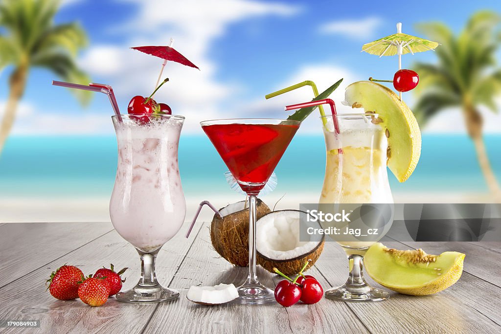SUmmer cocktails Summer cocktails with blur beach on background Asia Stock Photo