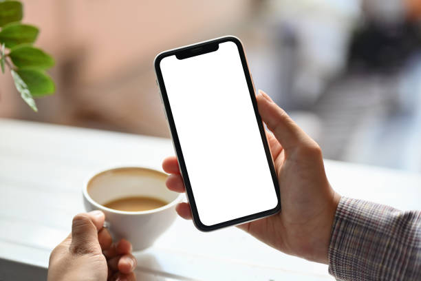 istock Woman hand holding mobile phone with white blank screen for your advertising text message 1790852630