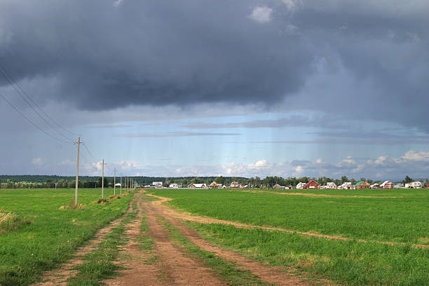 istock storm clouds and rain over the field 179085875
