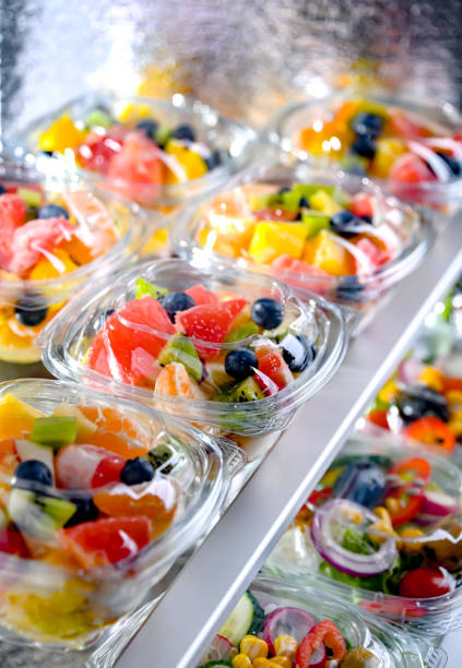 istock Boxes with pre-packaged fruit salads in a commercial fridge 1790868159