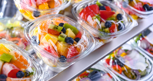 istock Boxes with pre-packaged fruit salads in a commercial fridge 1790868170
