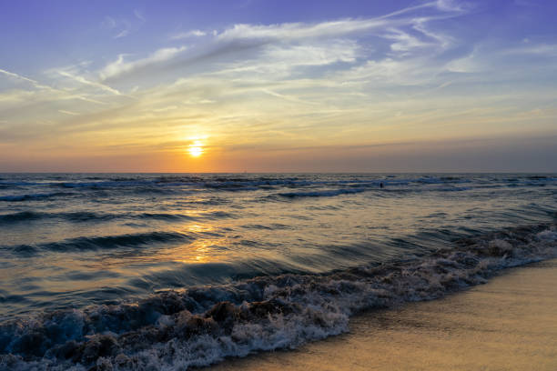 istock sunset on the beach in Tuscany, italy 1790884633