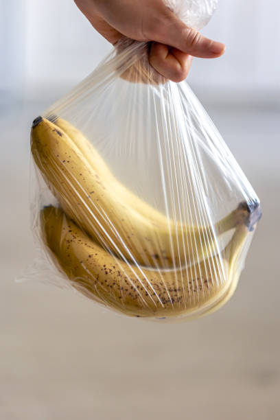 istock Ripe bananas in a plastic bag, close up. 1790893515